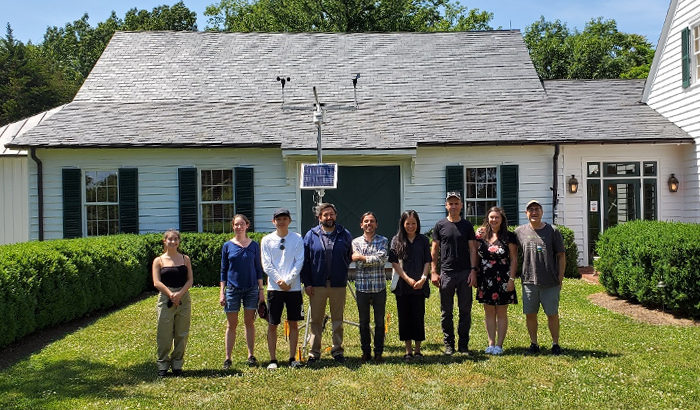 Figure 1. Project team members at our University of Virginia testing facility for terrestrial sensing equipment. From left to right: Mirella Shaban, PhD student; Caitlin Wylie, Assistant Professor - Science, Technology, and Society; Mikal Nelson, student from Utqiaġvik, Alaska; Lars Nelson, consultant, TRIBN, Inc. consultant, Utqiaġvik; Luis Felipe Rosado Murillo, Associate Researcher, School of Data Sciences; Leena Cho, Assistant Professor, Landscape Architecture; Matthew Jull, Associate Professor, Archite