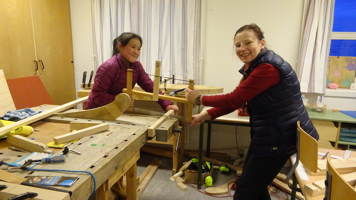 Figure 2. Cutting the wood (Grade 6 pupil Kamilla Korneliussen and teacher Kamilla Oliver). Photo courtesy of Kamilla Oliver.