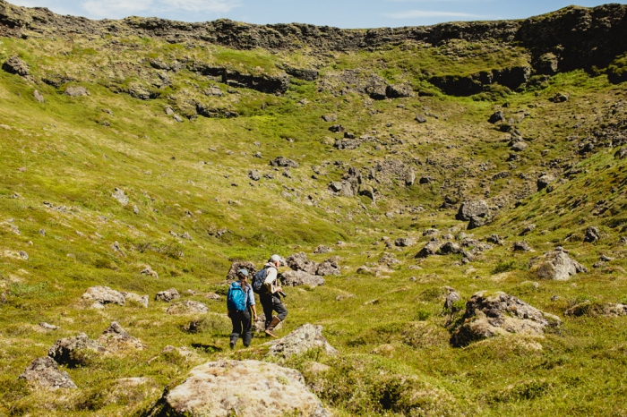 WHRC scientists Anya Suslova (left) and Max Holmes (right) traverse the Alaskan tundra. Their regional focus, the Arctic, is warming at twice the rate of global averages. Photo courtesy of Alison Smart.